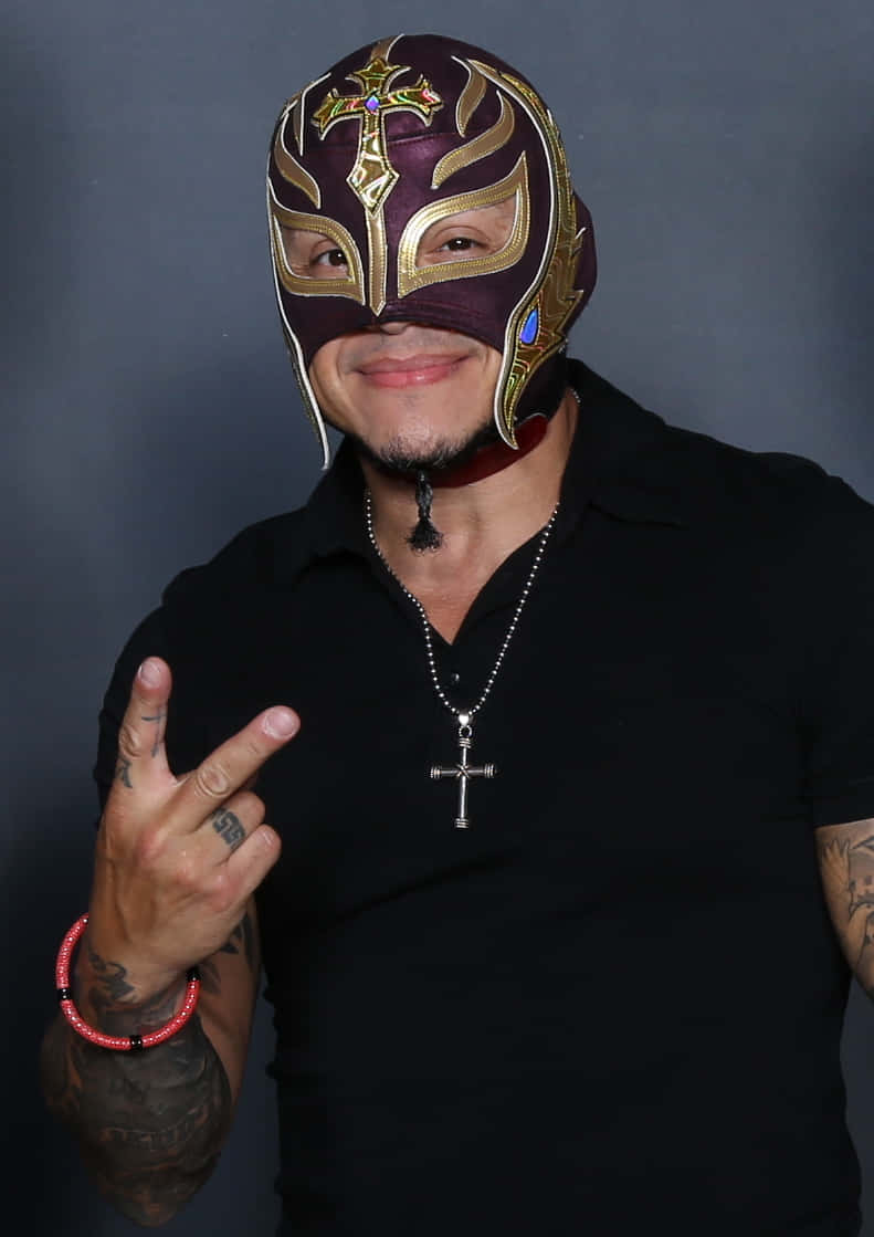 Rey_ Mysterio_ Posing_with_ Peace_ Sign Wallpaper