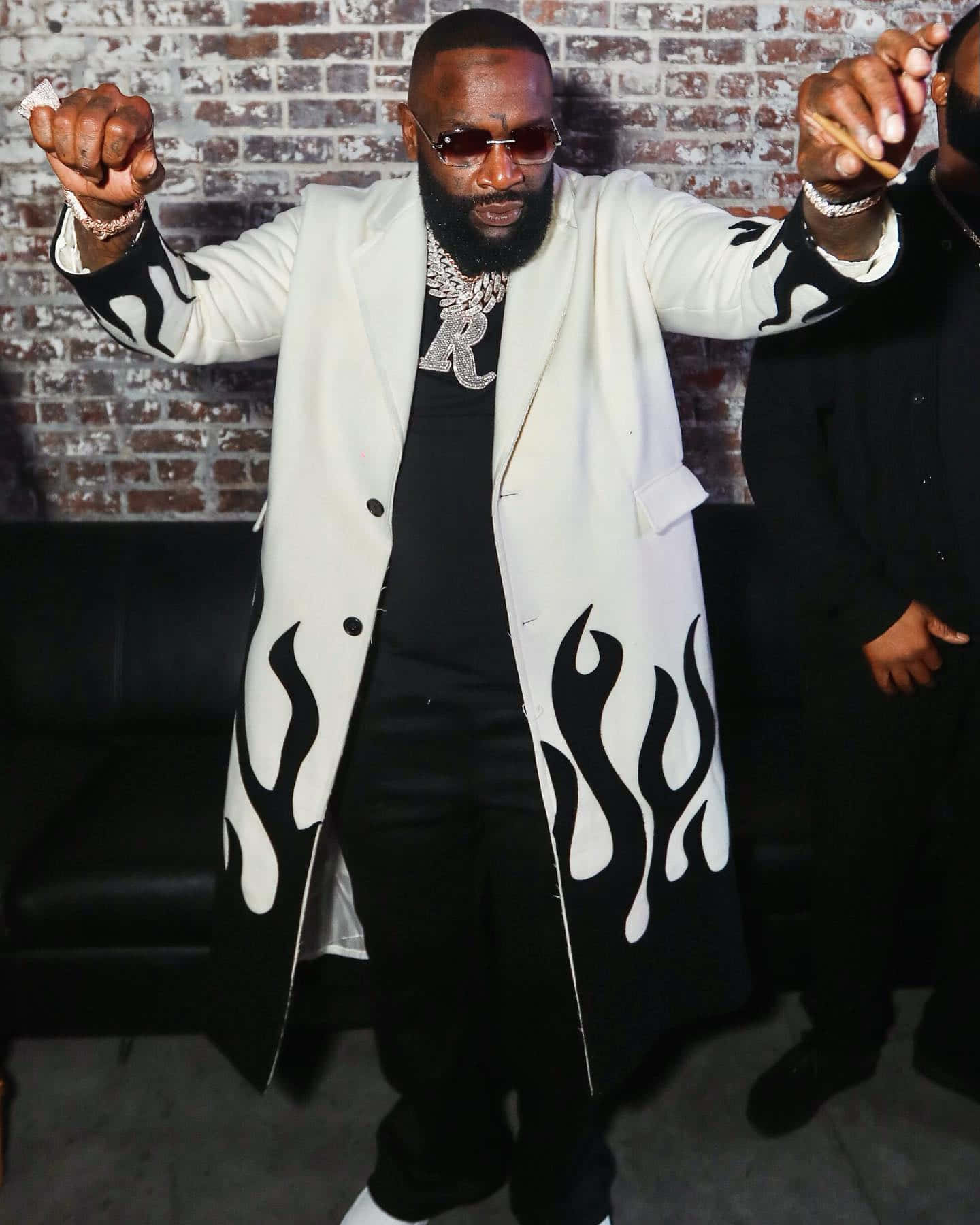 Rick Ross Flame Jacket Pose Wallpaper