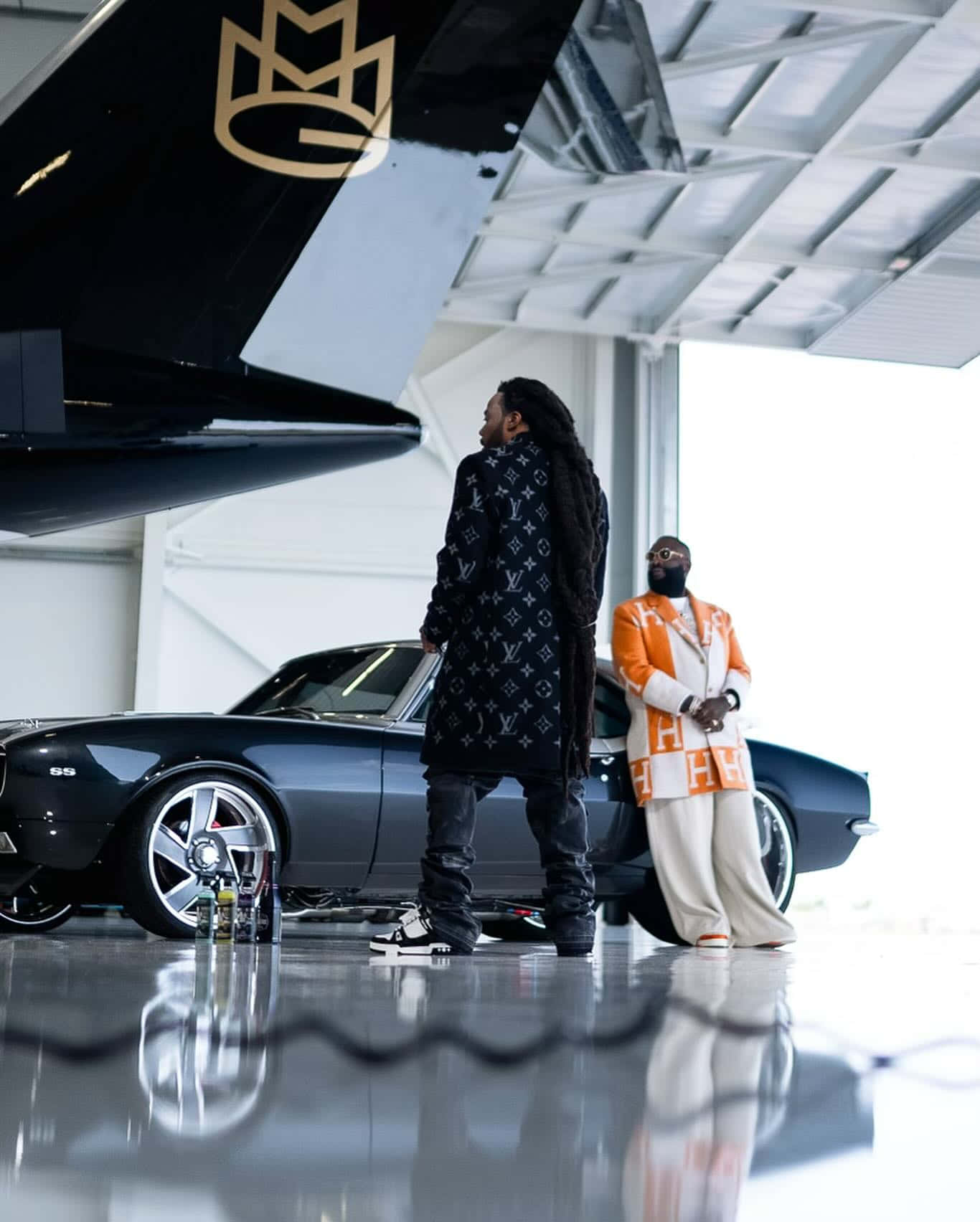 Rick Ross Private Jetand Classic Car Wallpaper