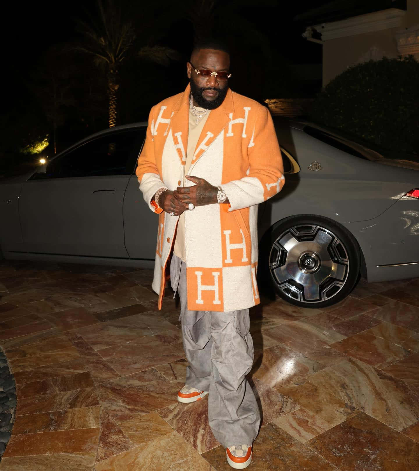 Rick Ross Stylish Outdoor Look Wallpaper