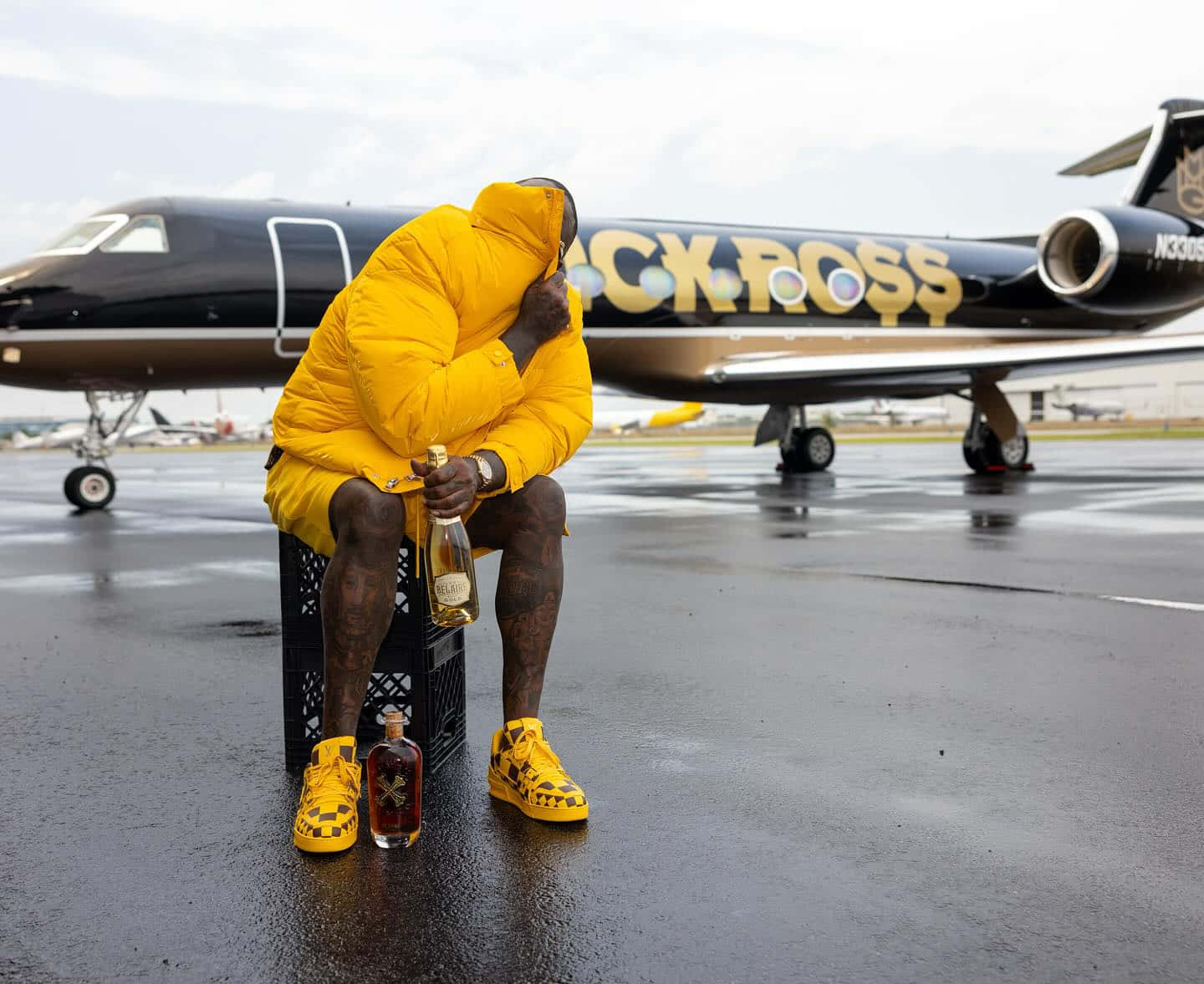 Rick Ross Yellow Jacket Private Jet Wallpaper