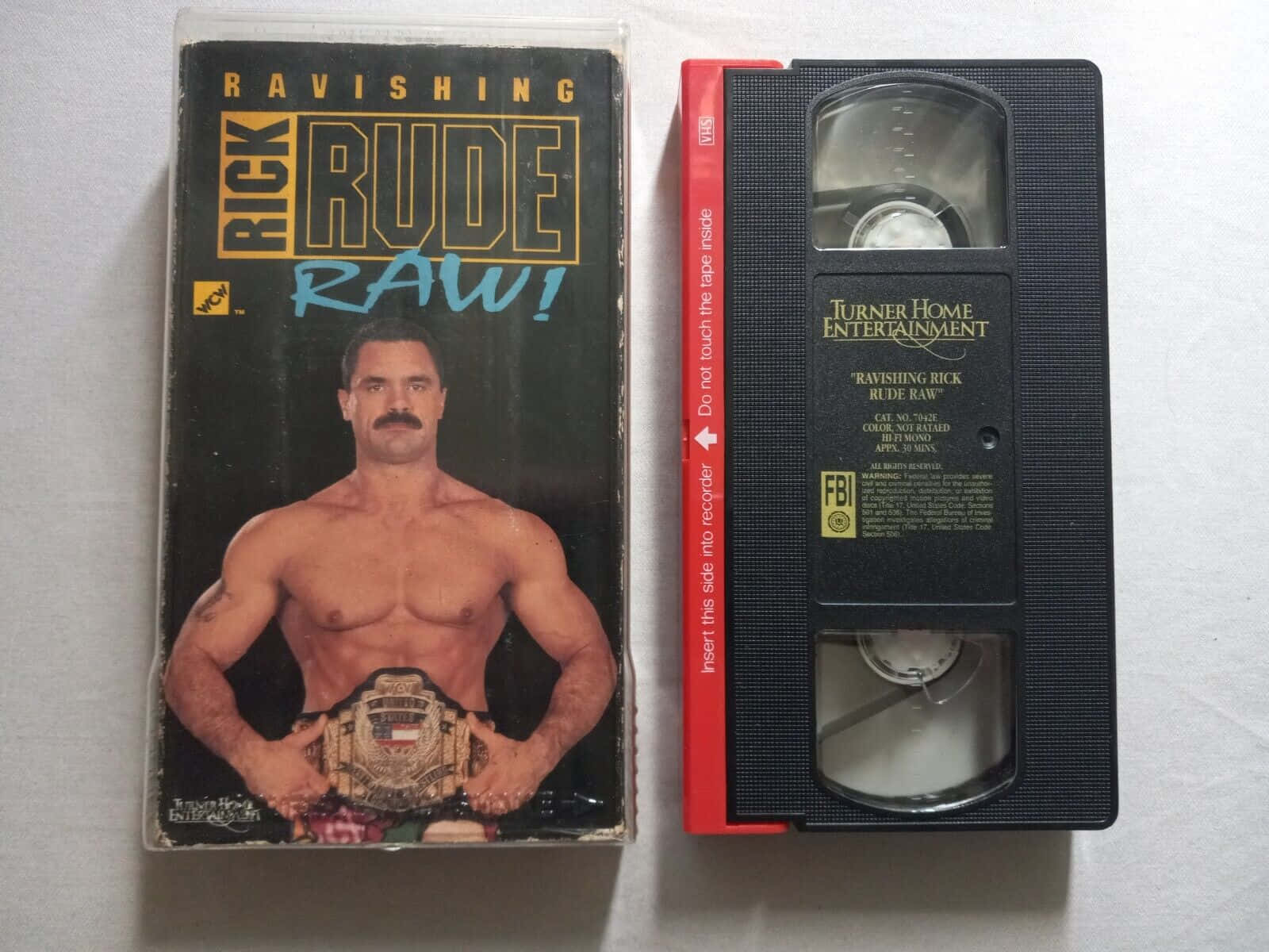 Rick Rude Wwe Raw Legend Vhs Tape Wallpaper