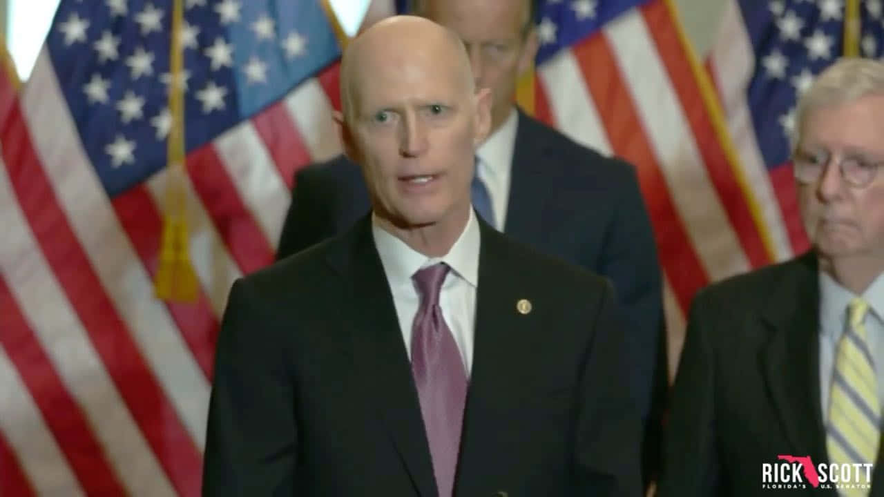 Rick Scott Speaking Wallpaper