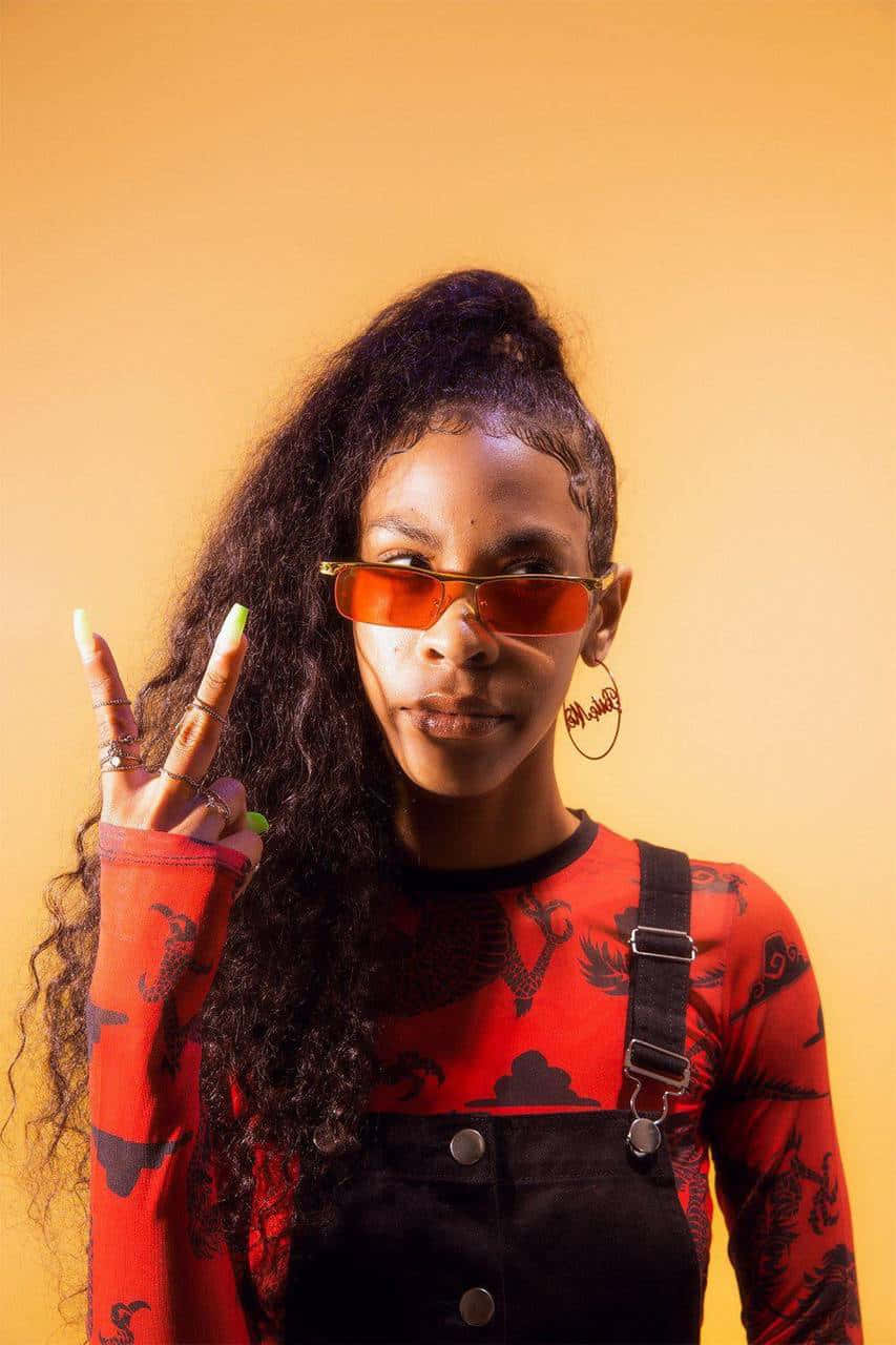 Rico Nasty Standing In The Spotlight Wallpaper