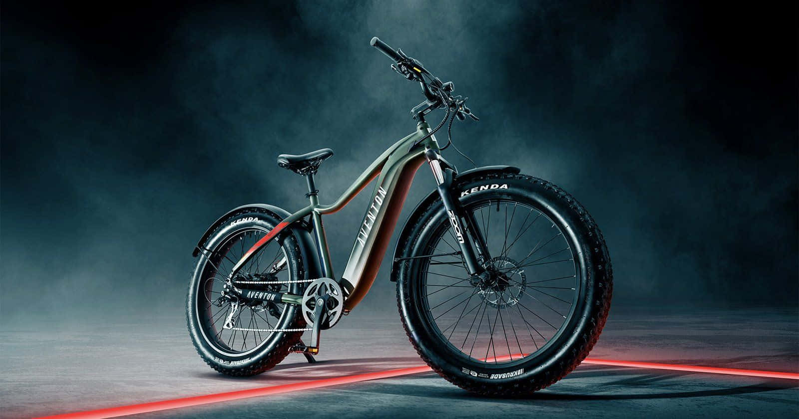 Riding Into The Future: Electric Bike On The Road Wallpaper