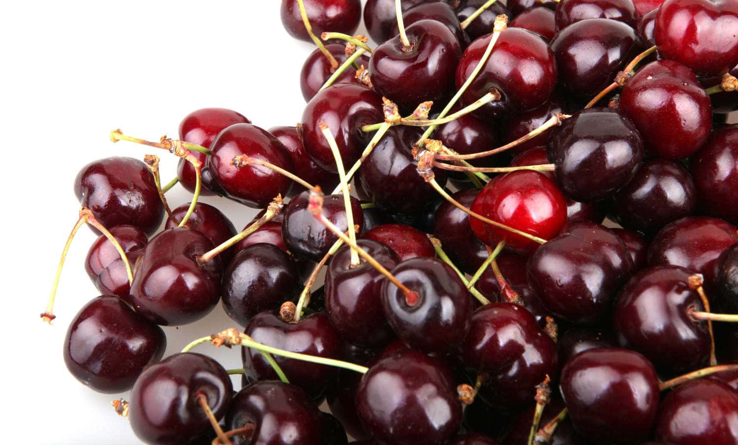 Ripe Red Cherries On Display Wallpaper