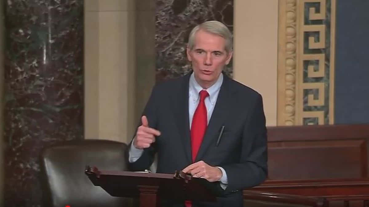 Rob Portman Passionately Discussing A Point During A Meeting Wallpaper