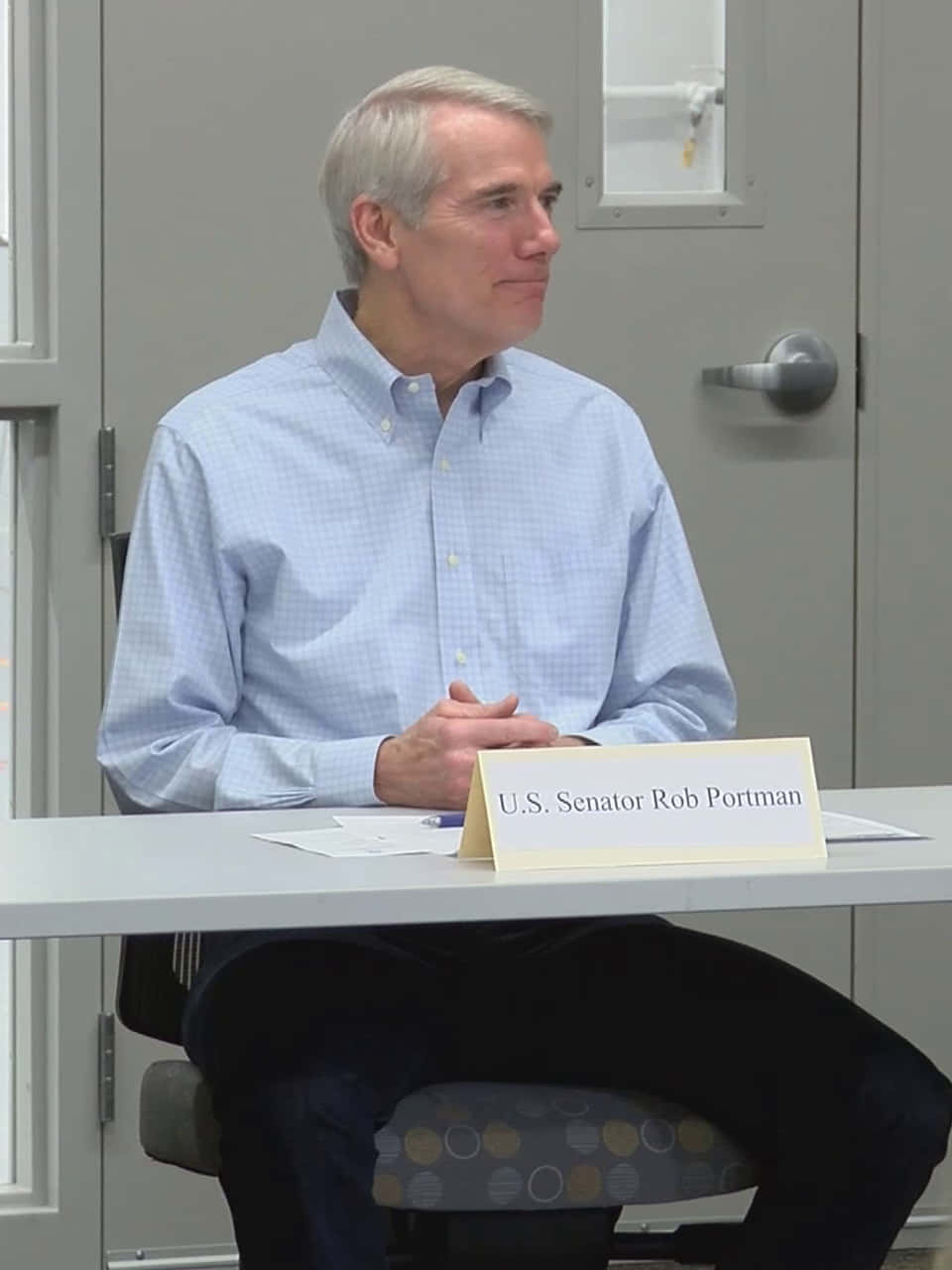 Rob Portman Sitting In Front Table Wallpaper