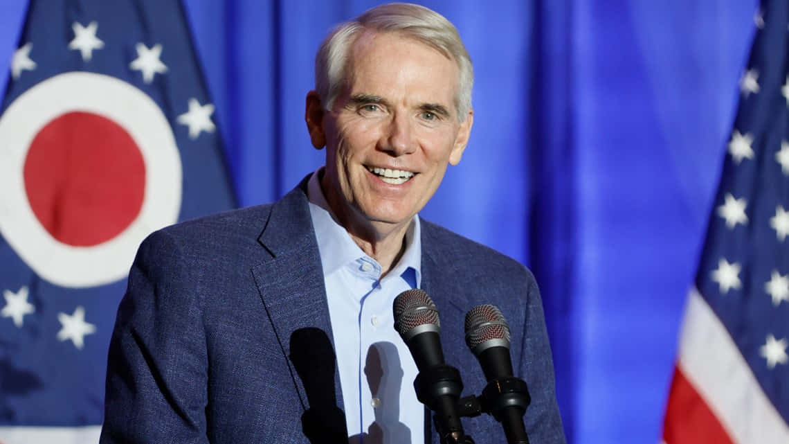 Rob Portman Smiling From Podium Wallpaper