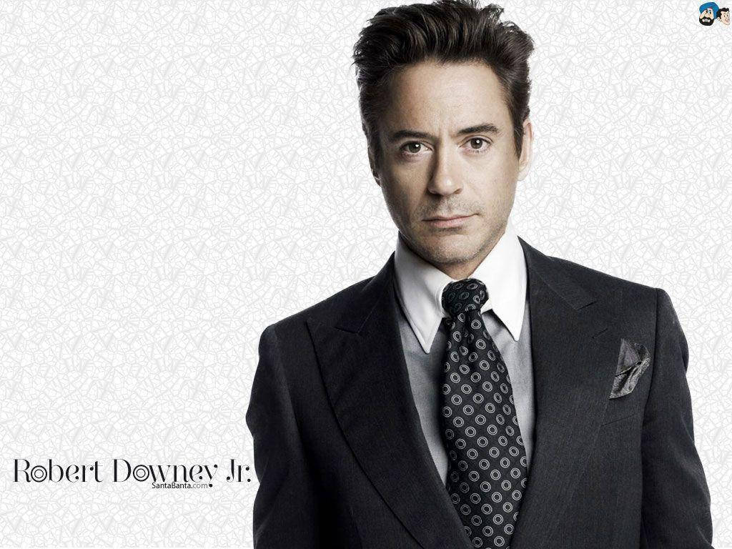 Robert Downey Jr. In The Iconic Role Of Iron Man Wallpaper