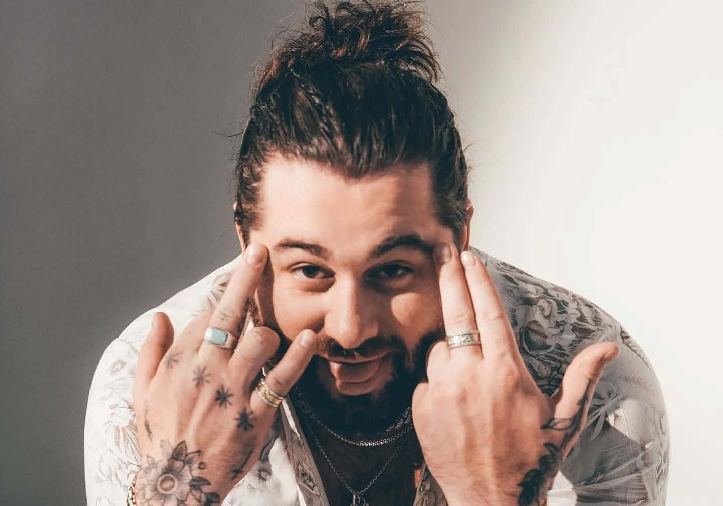 Rockstar Pose Man Tattooed Hands Wallpaper