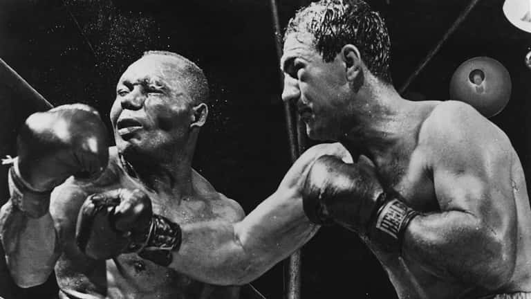 Rocky Marciano Stunning Victory Over Jersey Joe Walcott Wallpaper