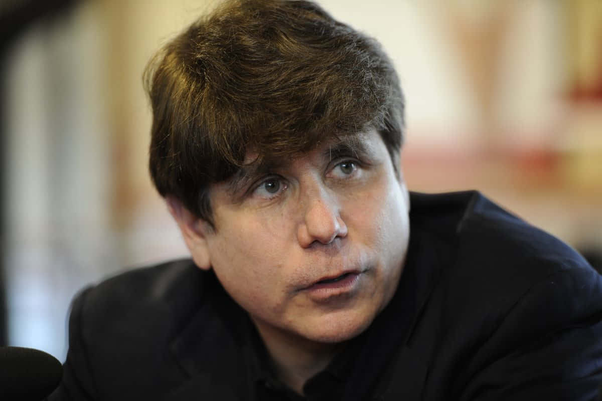 Rod Blagojevich Engaging In A Discussion Wallpaper