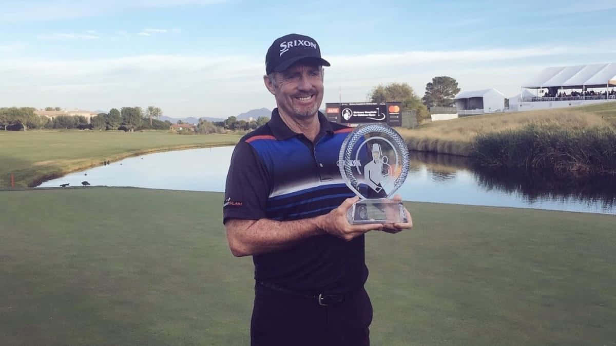 Rod Pampling Smiling With Trophy Wallpaper