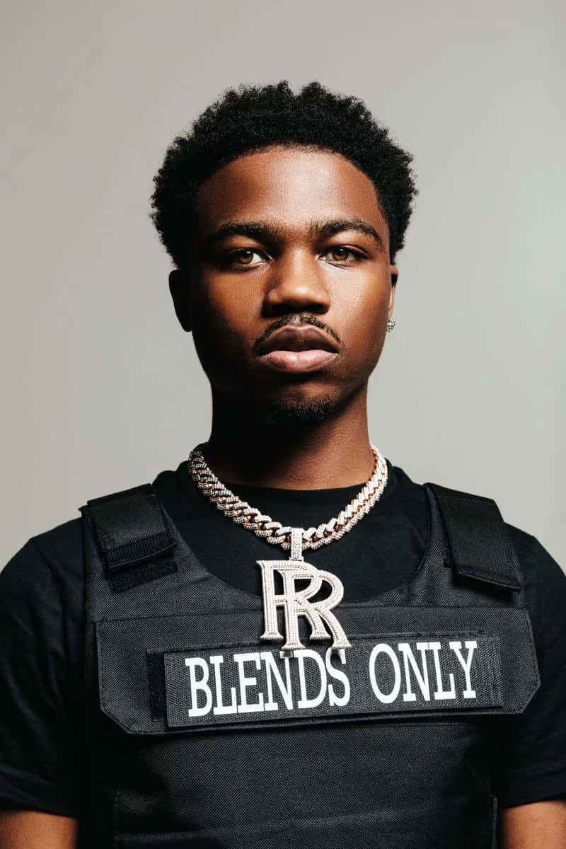 Roddy Ricch Performing Live On Stage Wallpaper