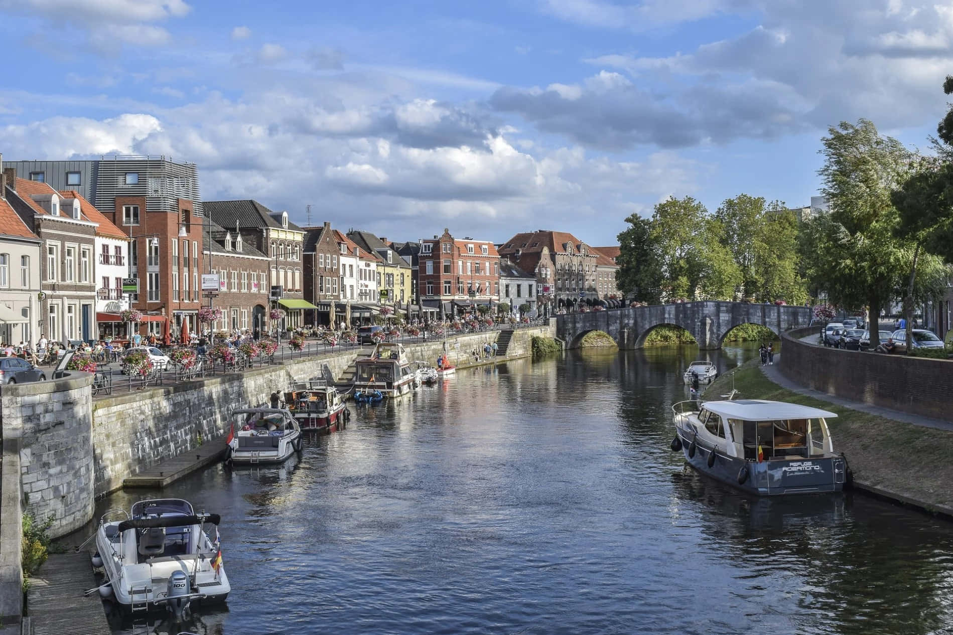 Roermond River Viewwith Stone Bridge Wallpaper