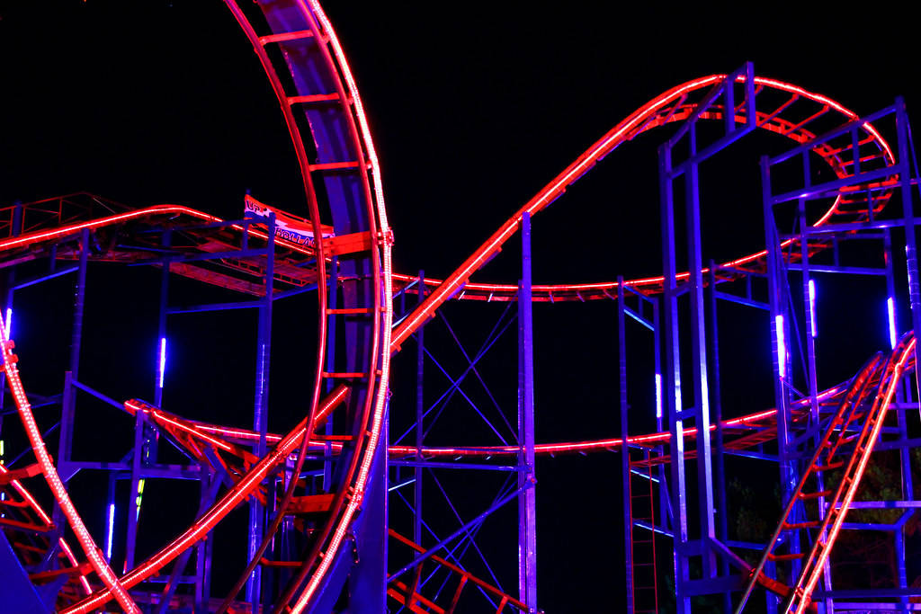 Roller Coaster Railway In Neon Colors Wallpaper