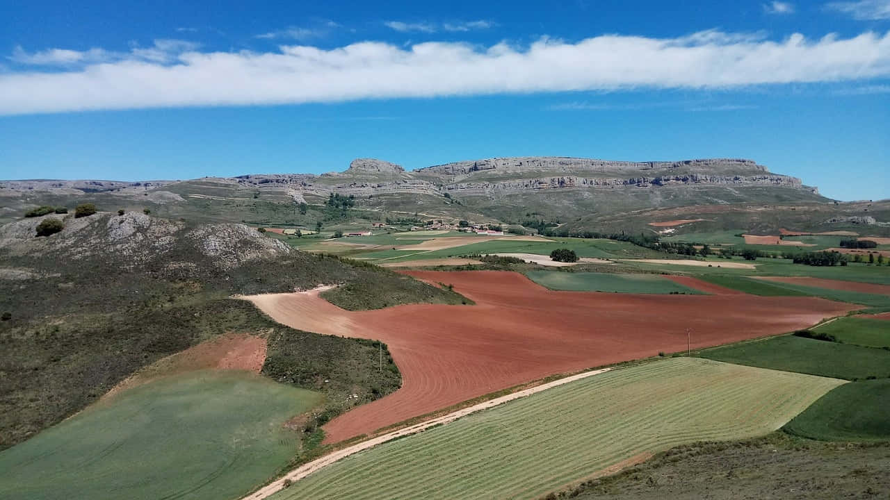 Rolling_ Farmland_and_ Eroded_ Plateaus Wallpaper