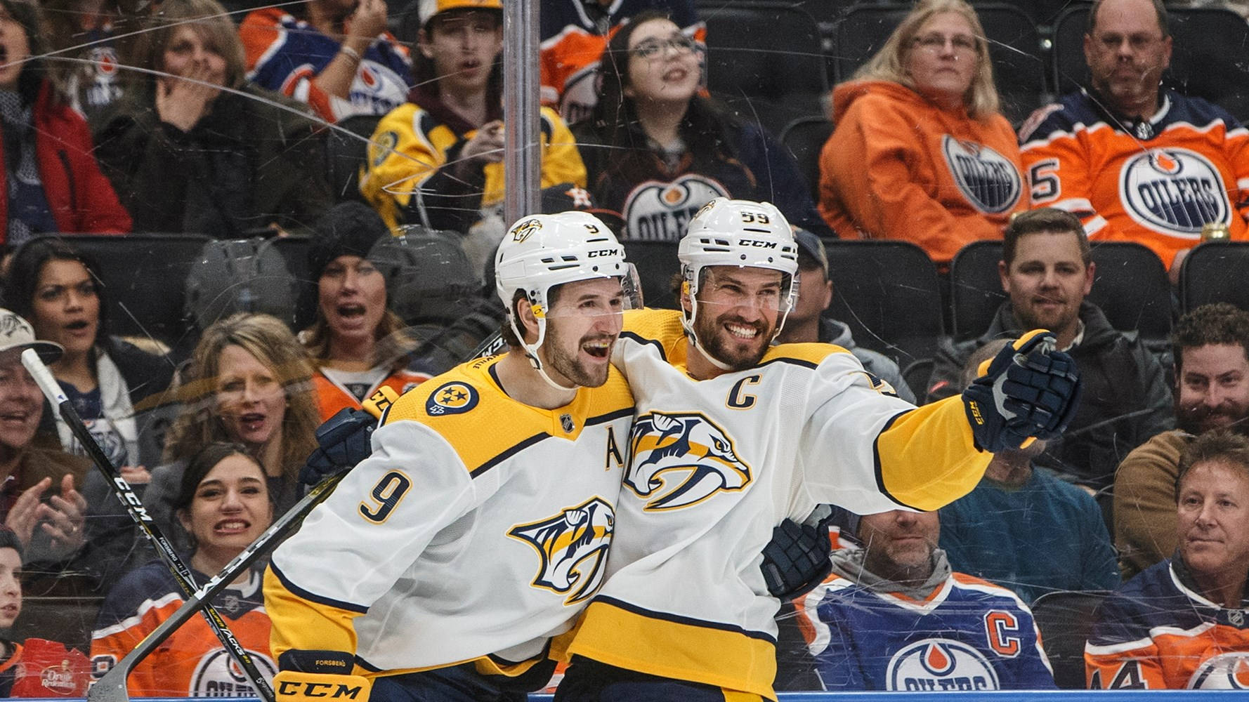 'roman Josi And Filip Forsberg Team Spirit' Wallpaper