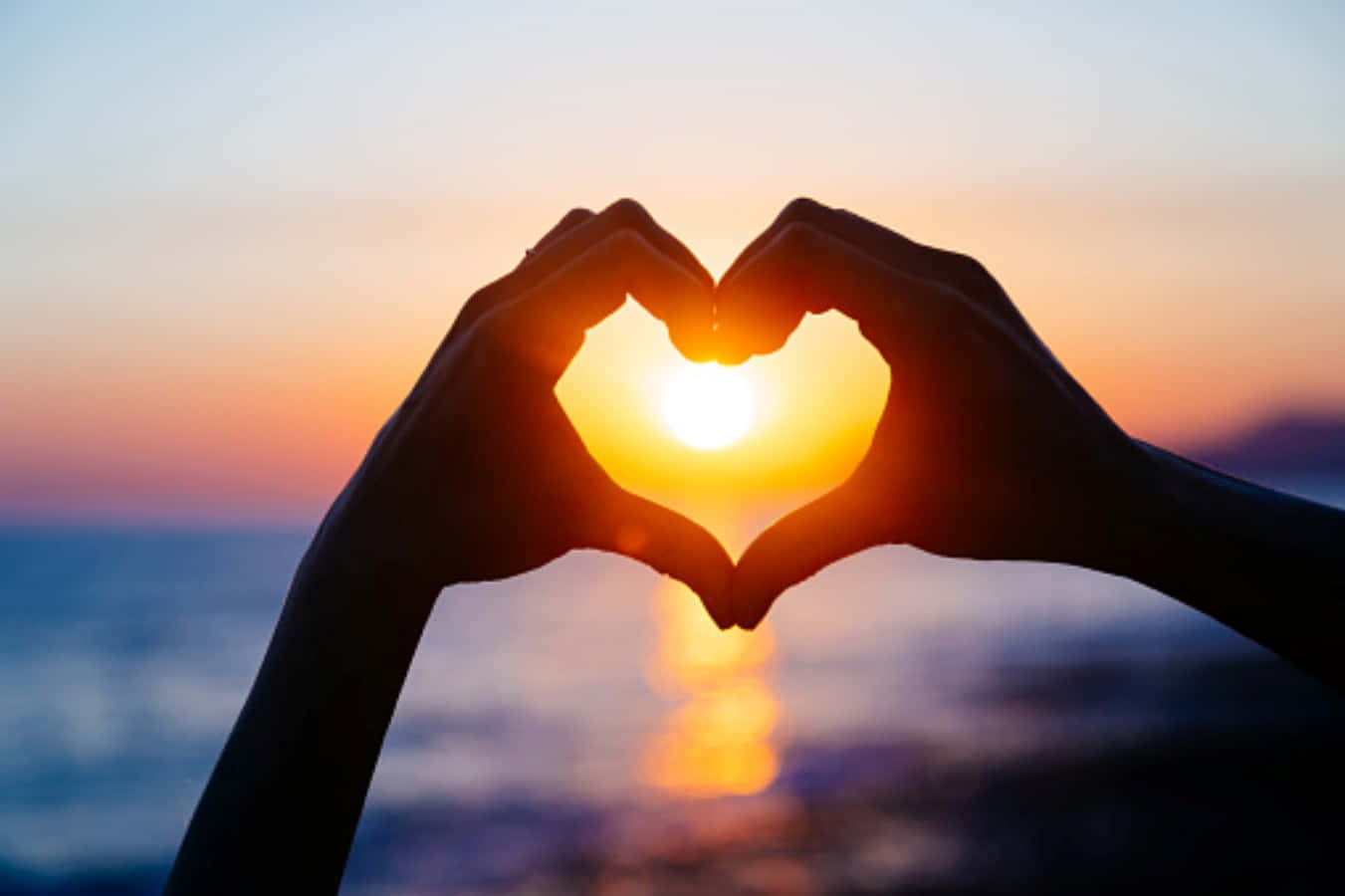 Romantic Heart Silhouette At Sunset Wallpaper