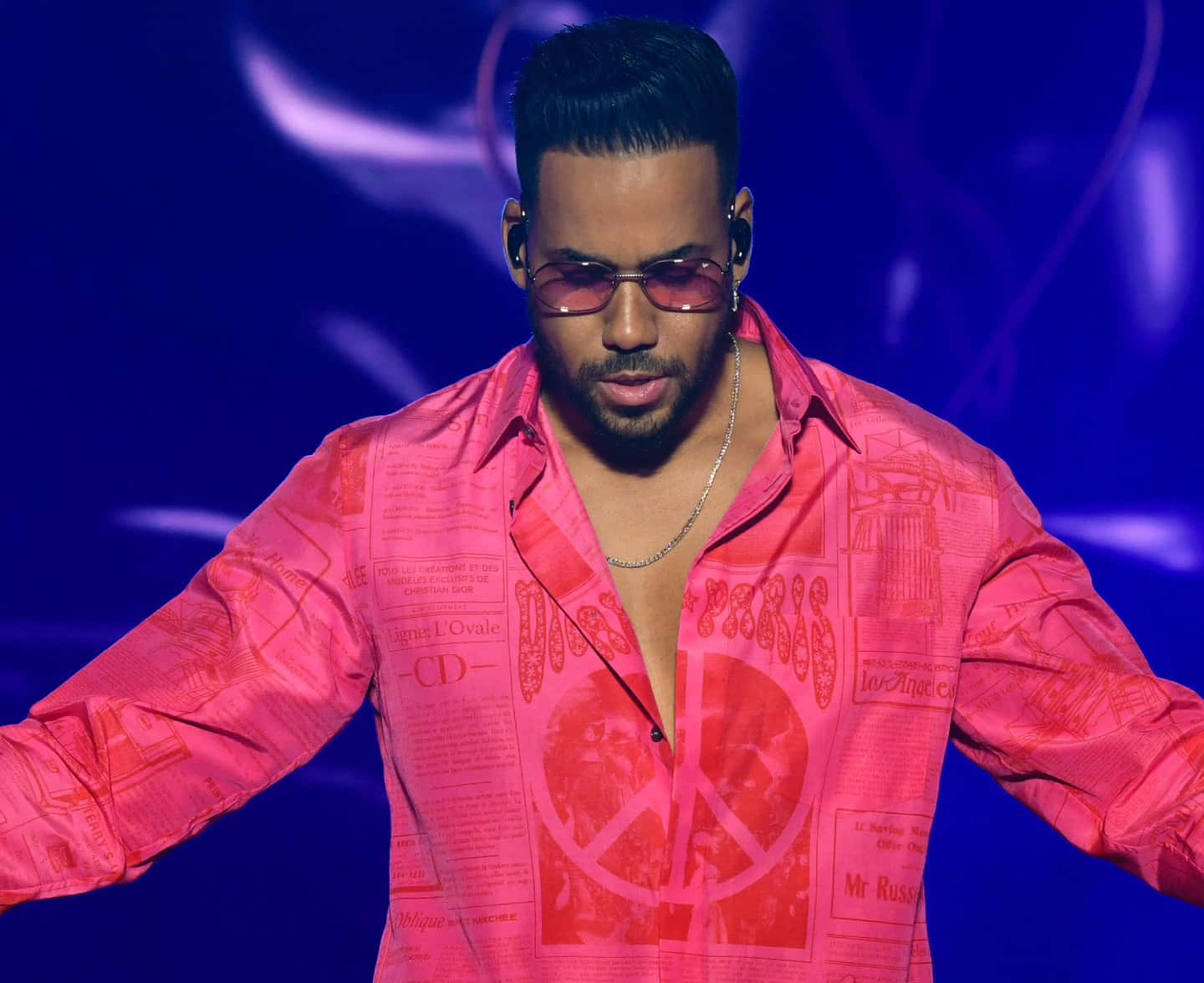 Romeo Santos Performingon Stage Wallpaper