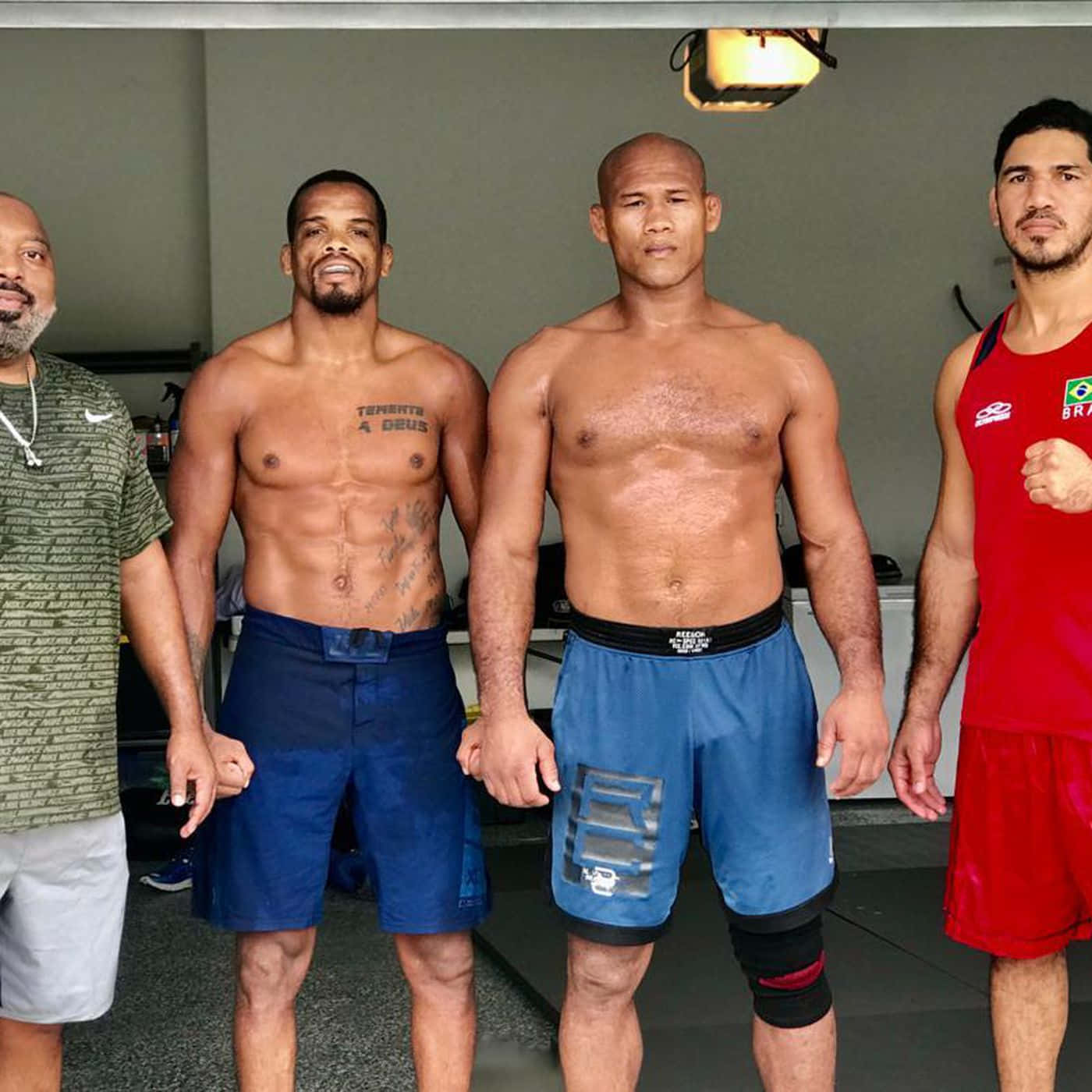 Ronaldo Souza Poses With His Team After A Successful Match Wallpaper