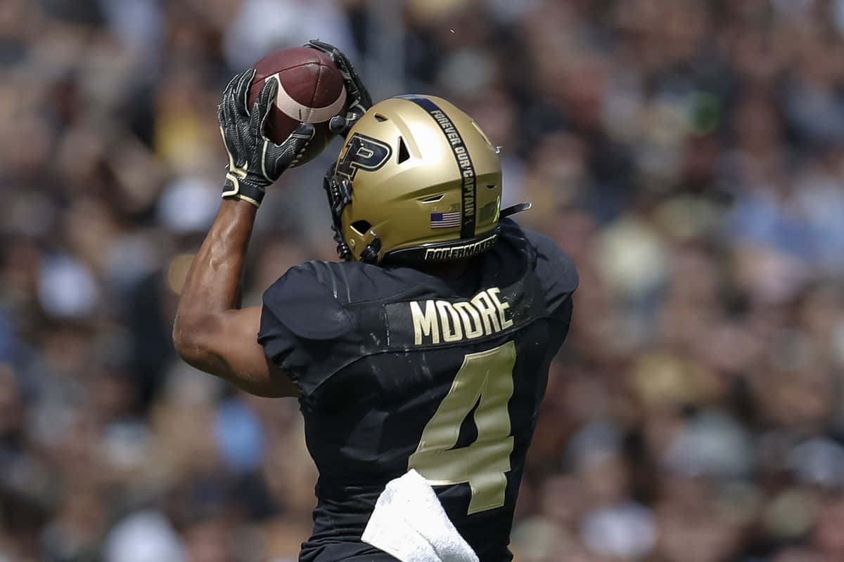 Rondale Moore Catching Football Wallpaper