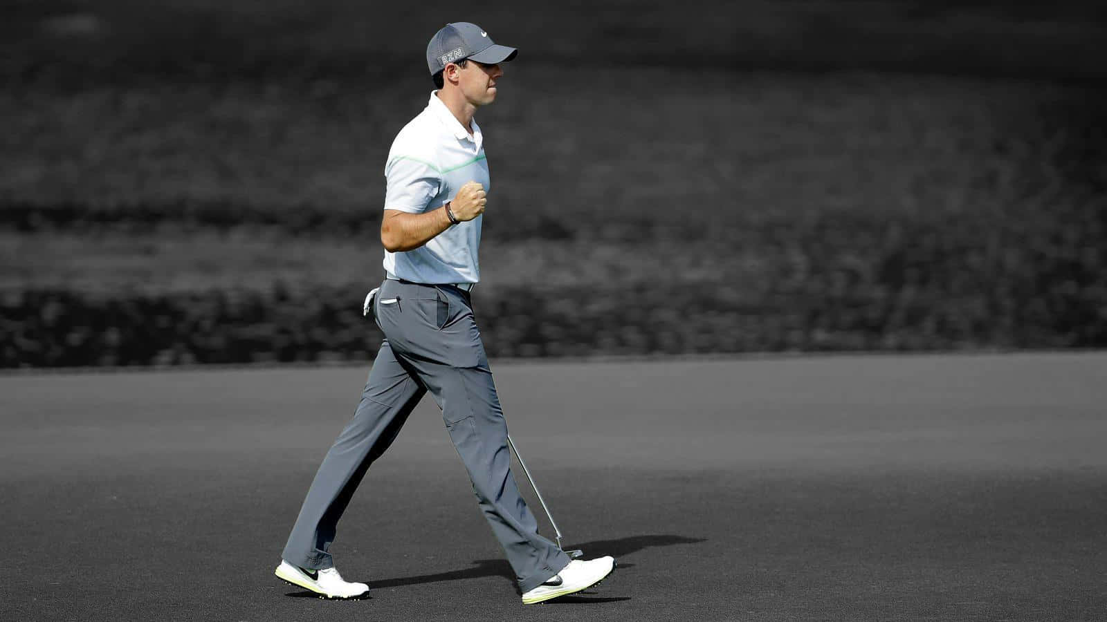 Rory Mcilroy Celebrates During A Golf Tournament Wallpaper