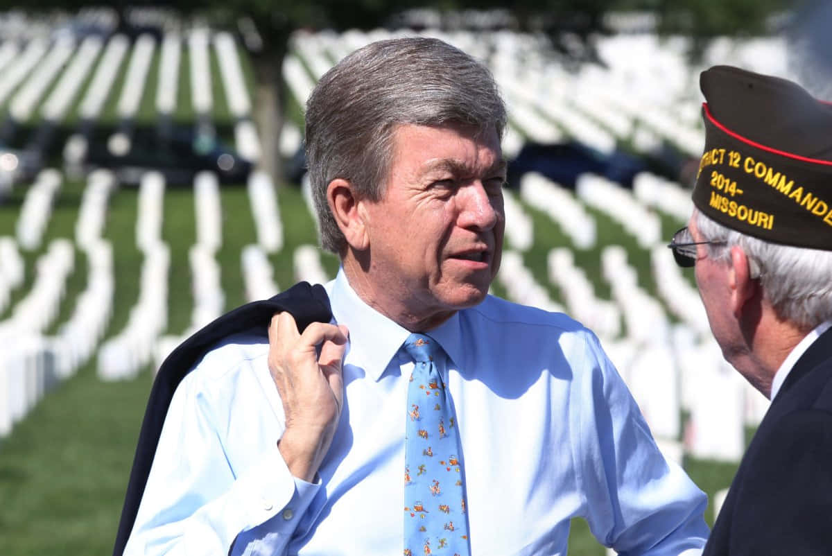 Roy Blunt Visiting A Cemetery Wallpaper