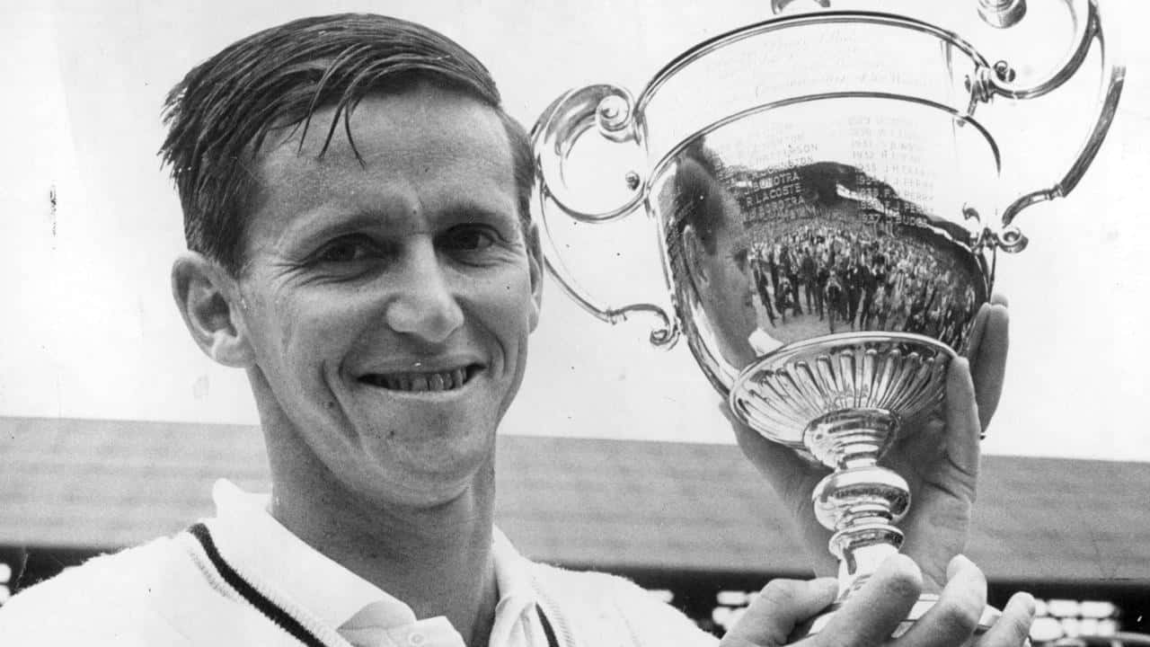 Roy Emerson Tennis Champion Trophy Victory Wallpaper