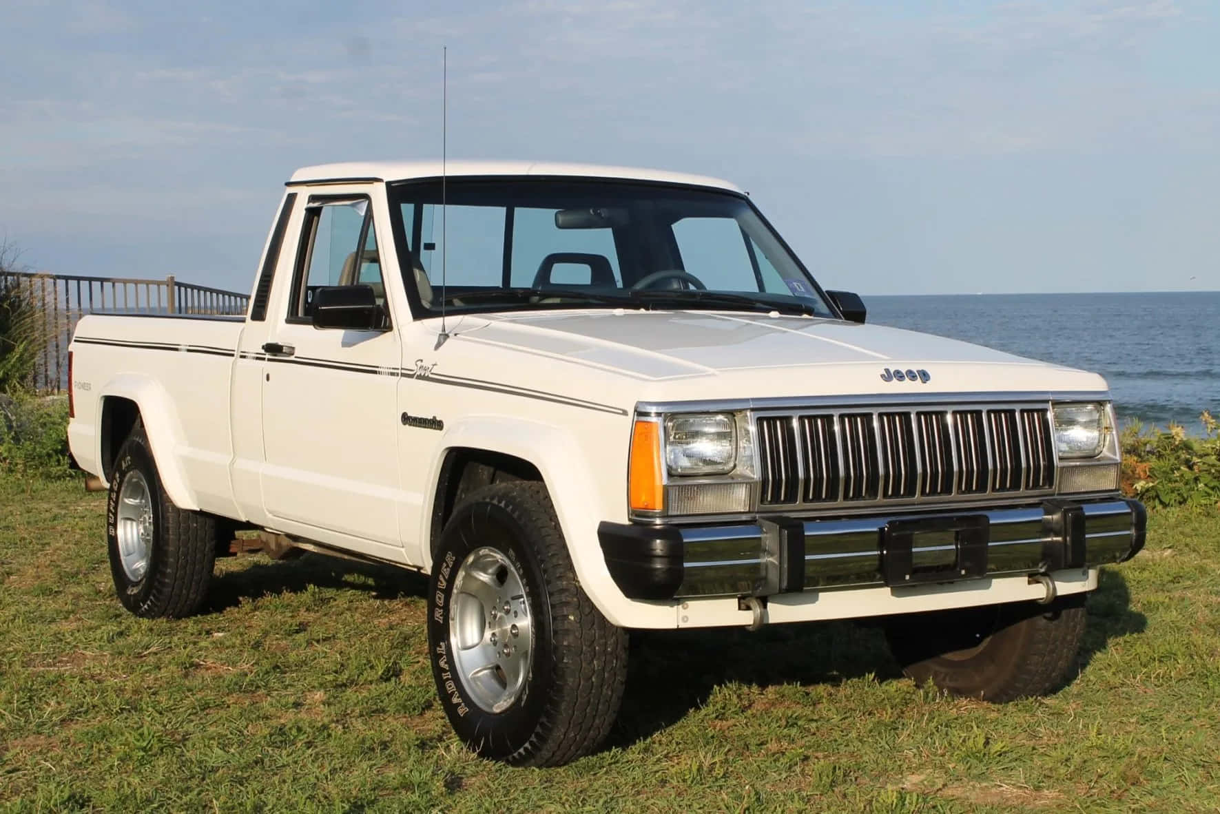 Rugged Jeep Comanche Conquering The Off-road Terrain Wallpaper