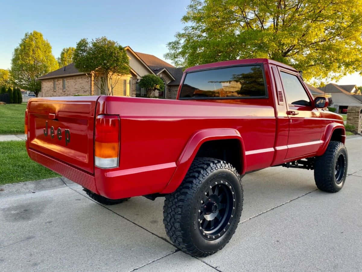 Rugged Jeep Comanche Conquers Off-road Terrain Wallpaper