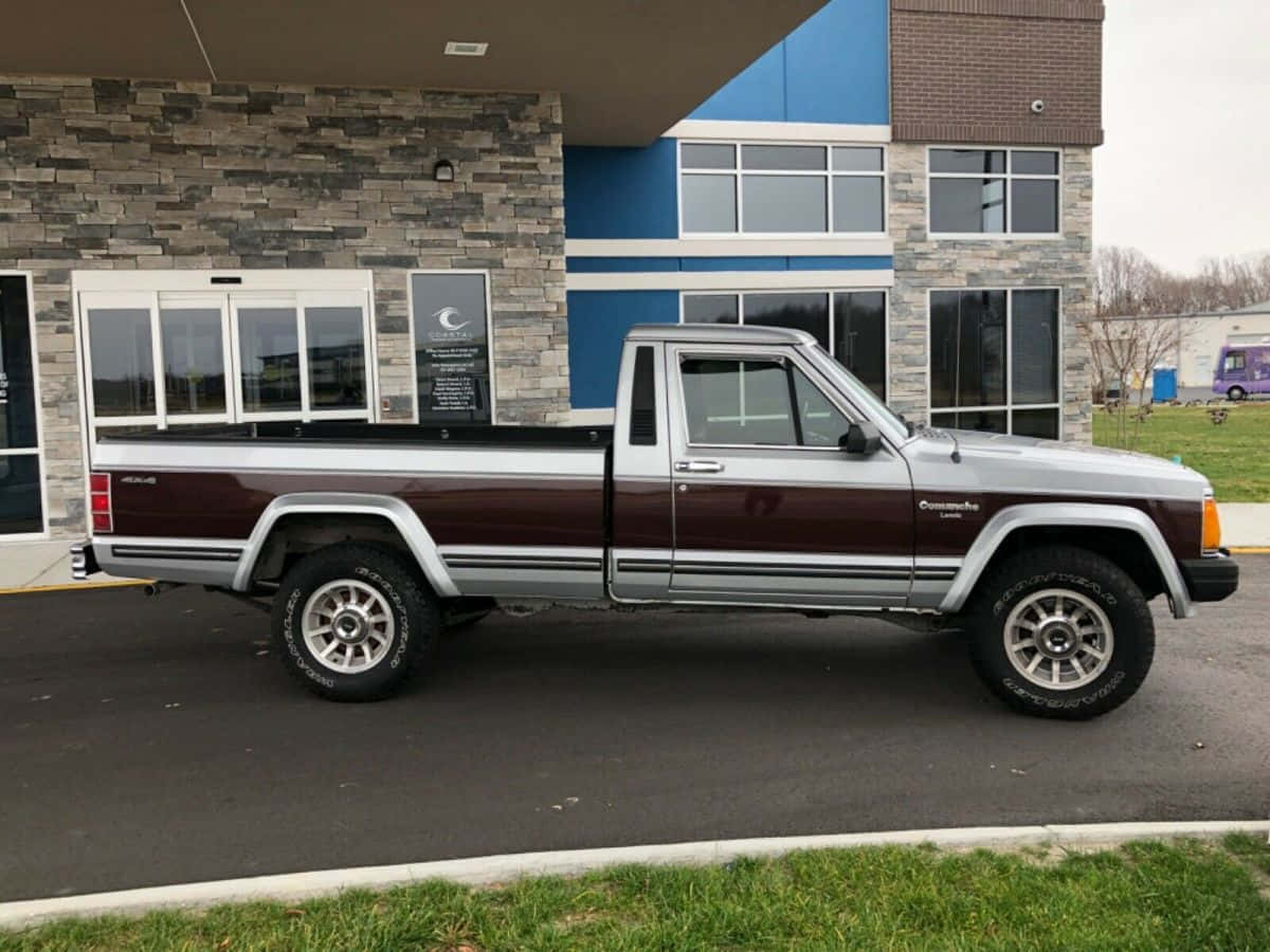 Rugged Off-road Jeep Comanche Adventure Wallpaper