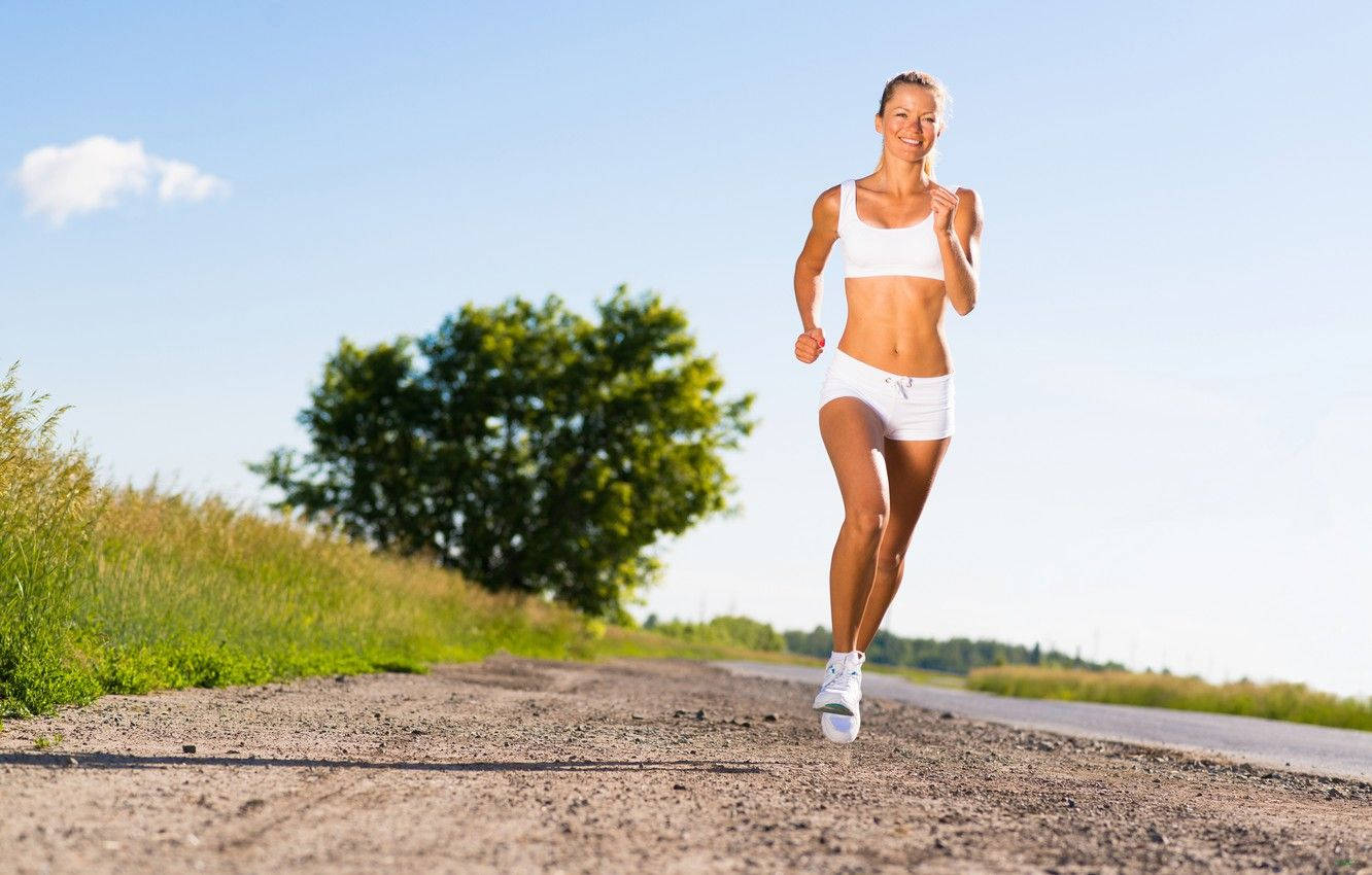 Runner In White Outfit Wallpaper