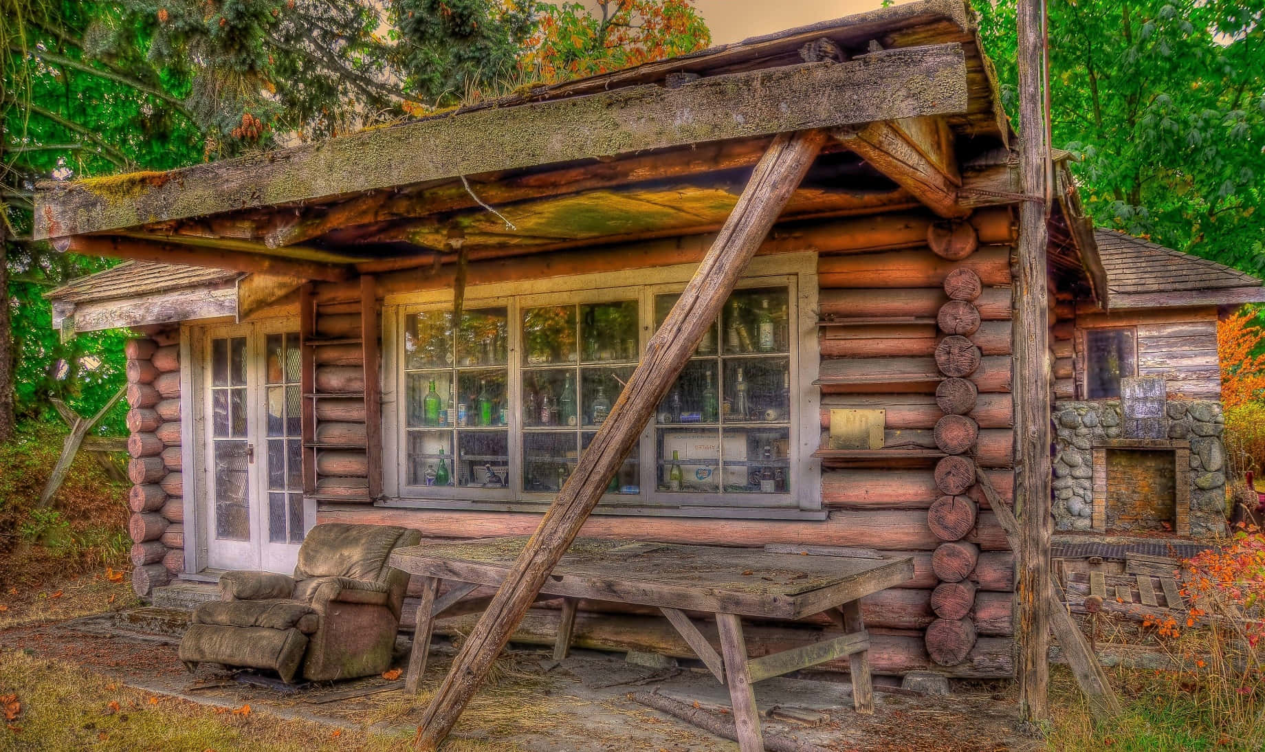 Rustic Log Cabin Exteriorwith Fireplace Wallpaper