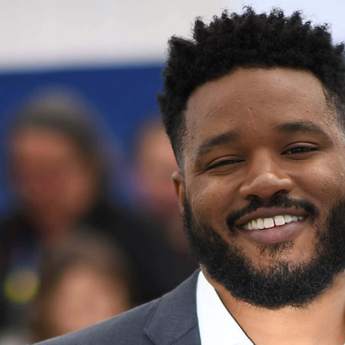 Ryan Coogler In An Interview Setting Wallpaper