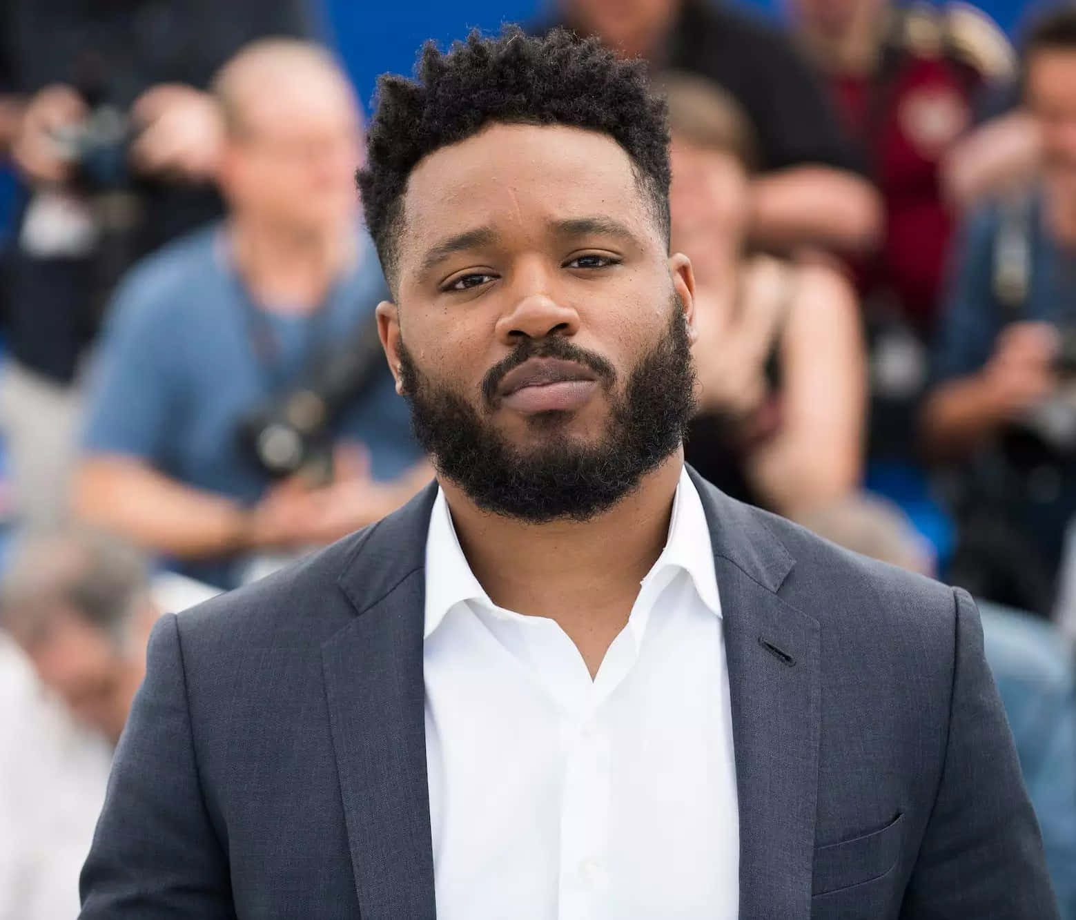 Ryan Coogler Posing At An Event Wallpaper