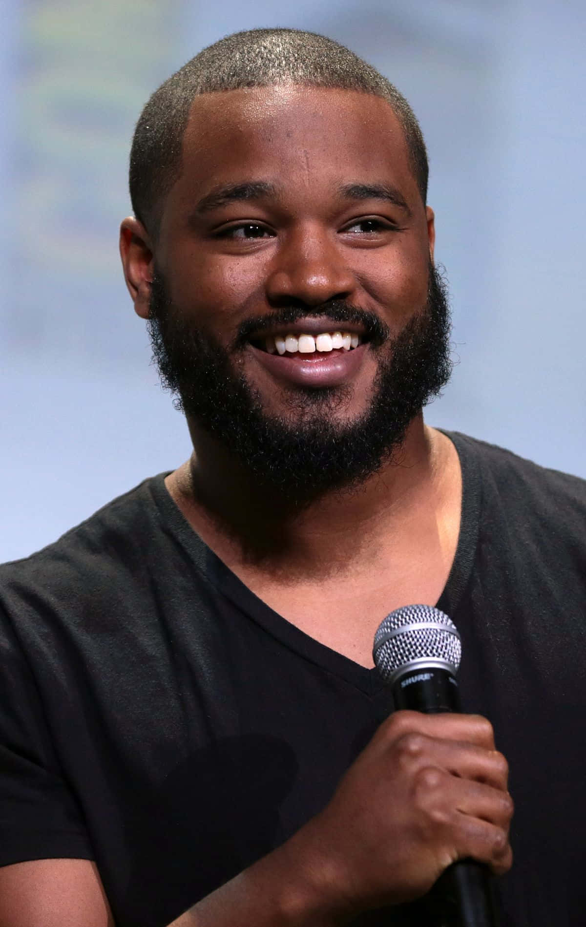 Ryan Coogler Posing For A Portrait Wallpaper