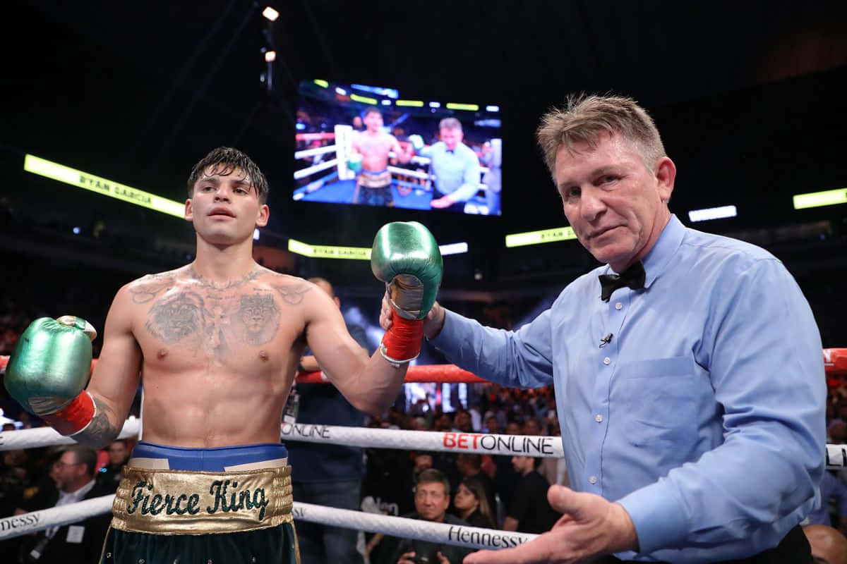 Ryan Garcia Held By Referee Wallpaper