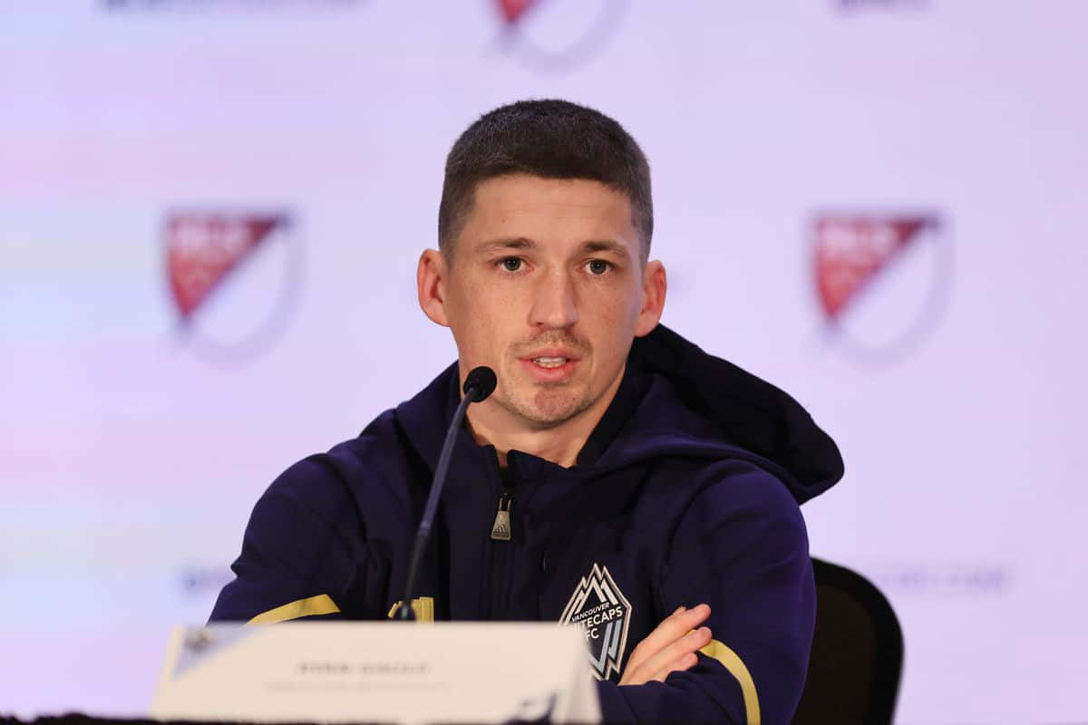 Ryan Gauld Speakingat Press Conference Wallpaper