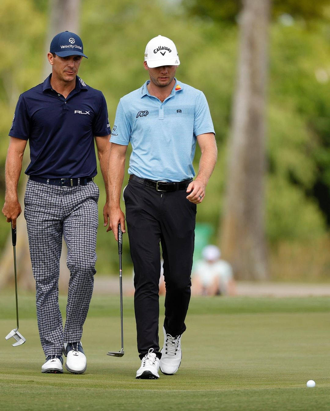 Sam Burns Walking With Fellow Golfer Wallpaper