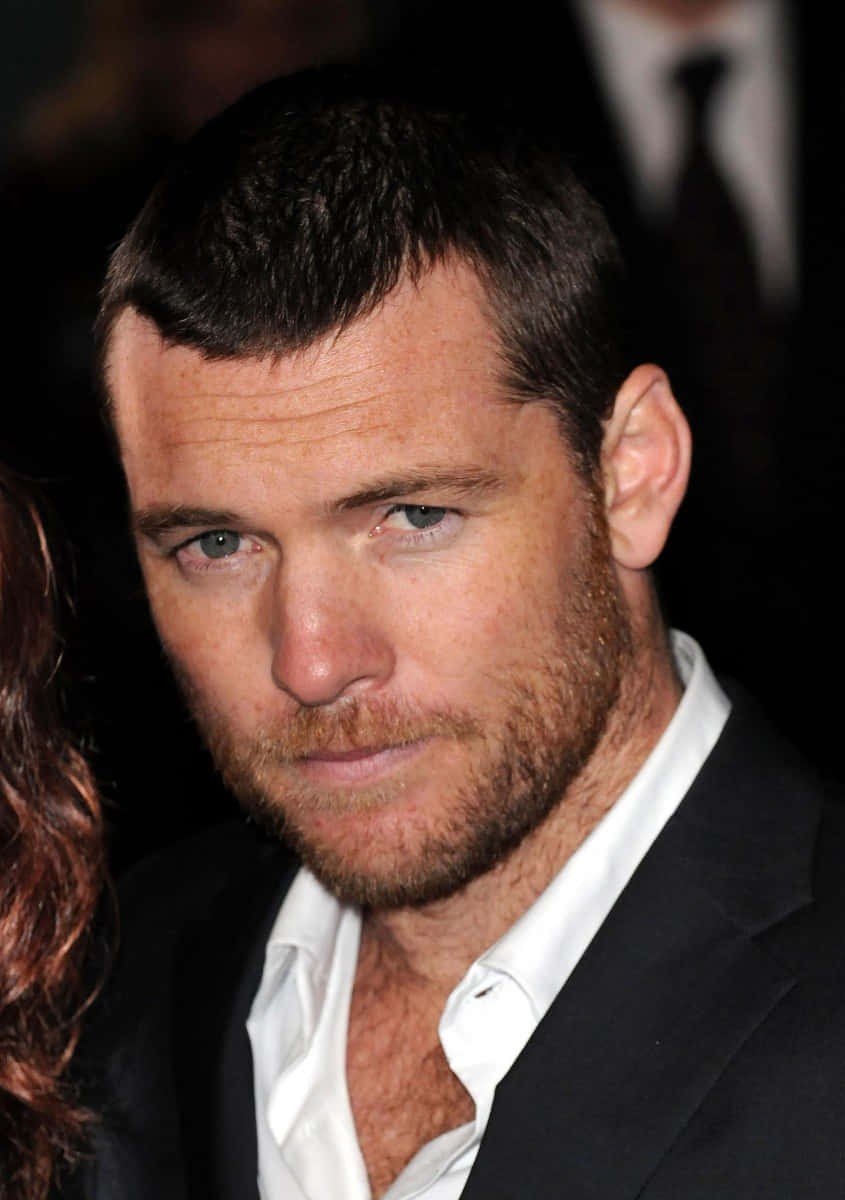 Sam Worthington Lip Bite Profile Photo Wallpaper