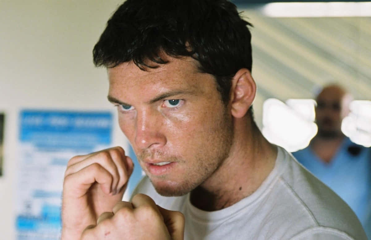 Sam Worthington Punch Scene Movie Wallpaper