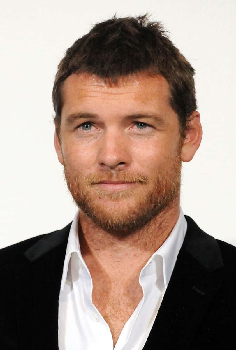 Sam Worthington Smiling Profile Photo Wallpaper