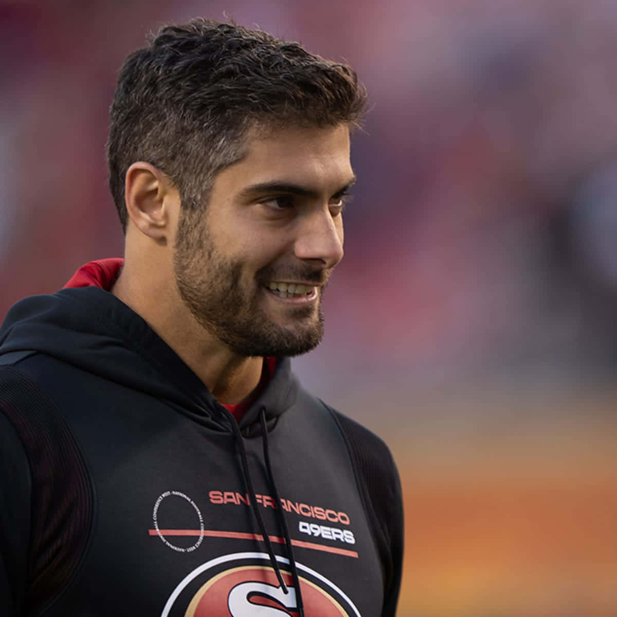 San Francisco 49ers Quarterback Jimmy Garoppolo In Action Wallpaper