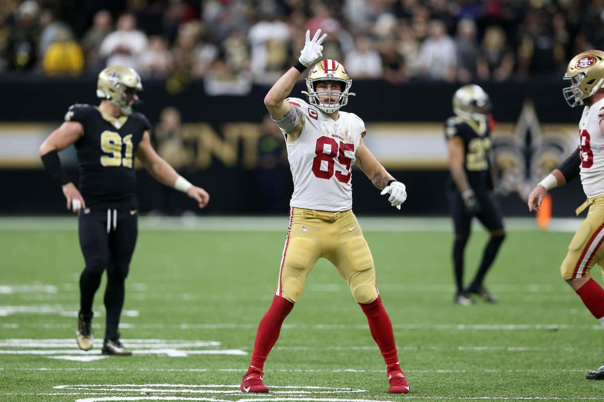 San Francisco 49ers Tight End George Kittle Explodes Into The End Zone Wallpaper