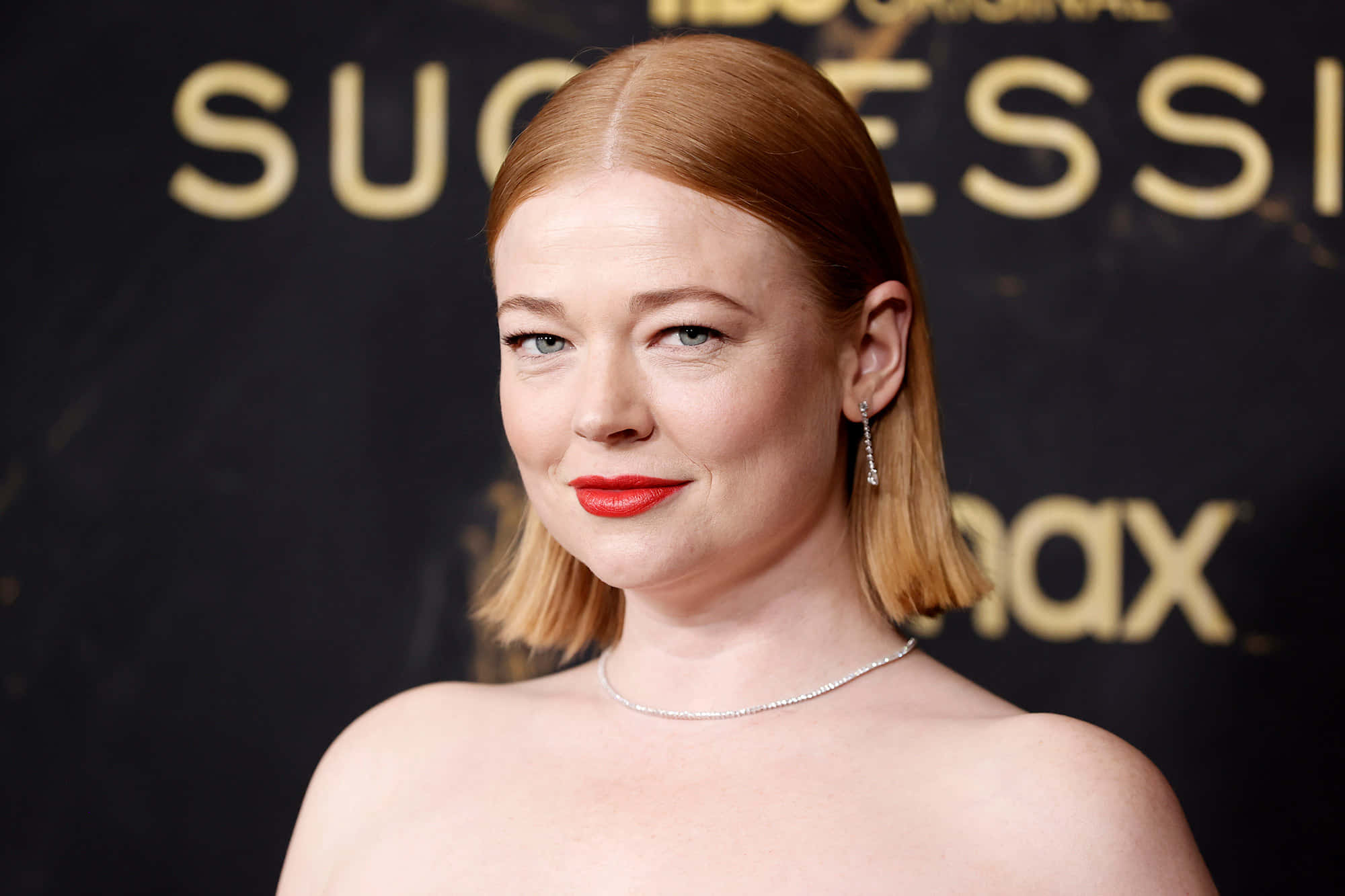 Sarah Snook Exuding Confidence On The Red Carpet Wallpaper