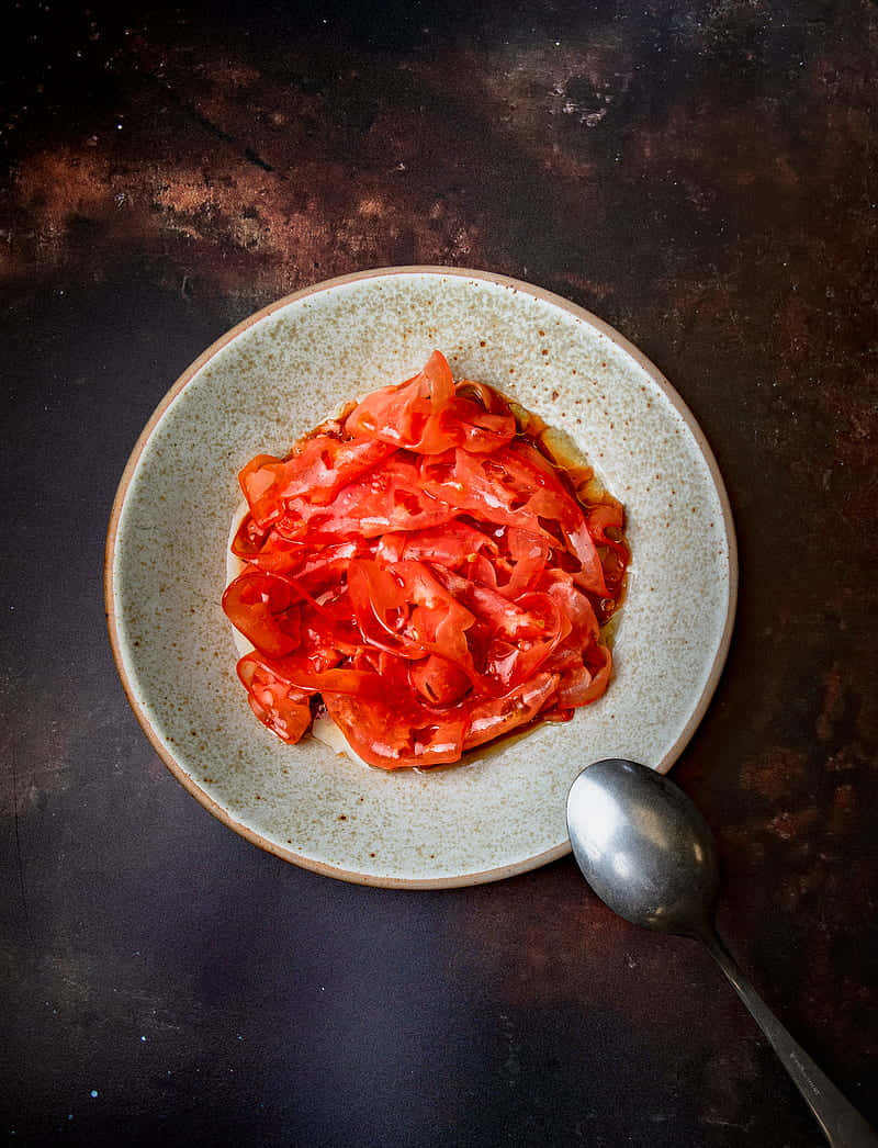 Savory Red Sauce In A Glass Jar Wallpaper