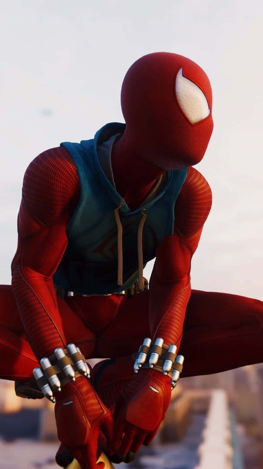 Scarlet Spider Crouchingon Rooftop Wallpaper