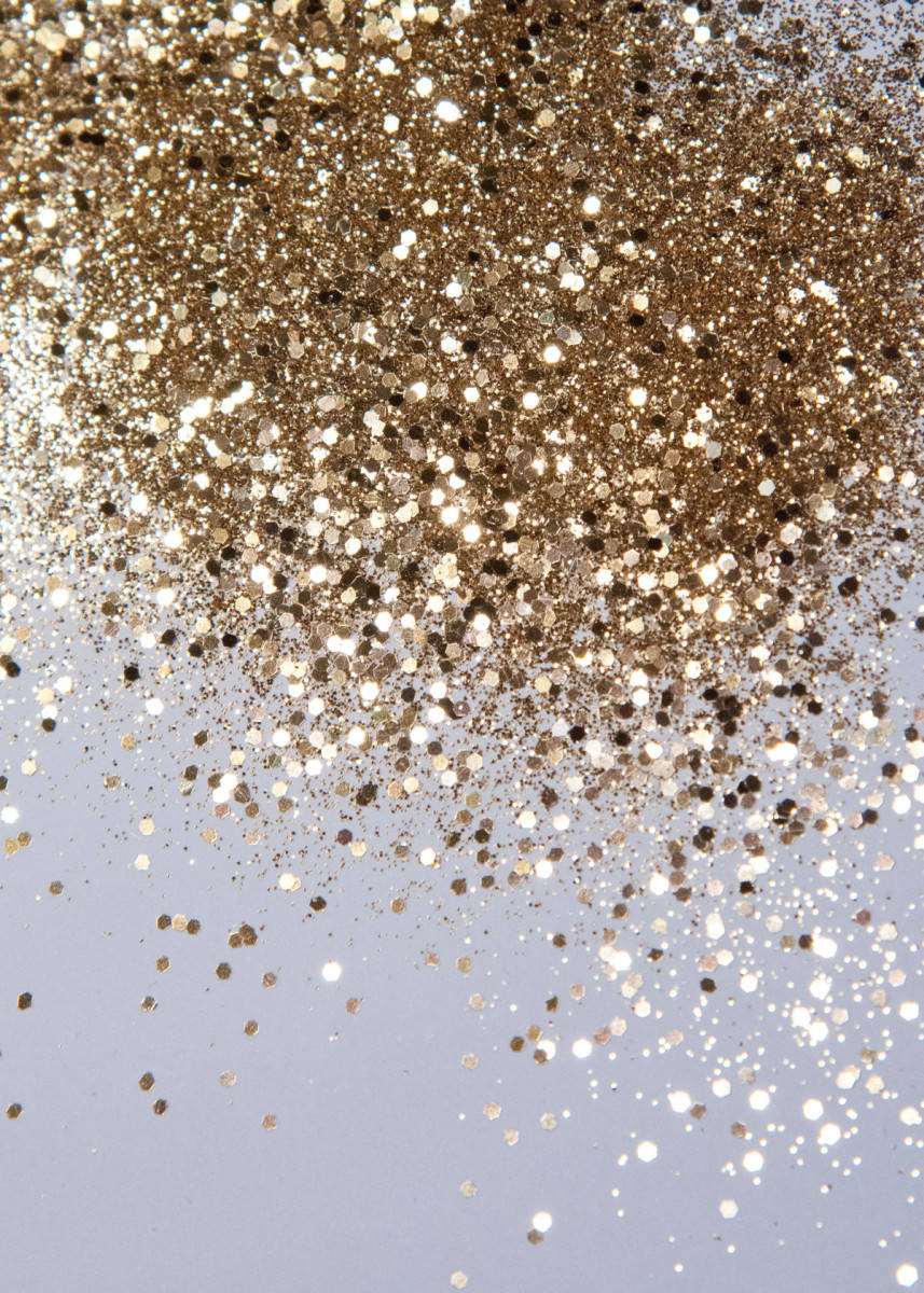 Scattered Black And Gold Glitter Wallpaper